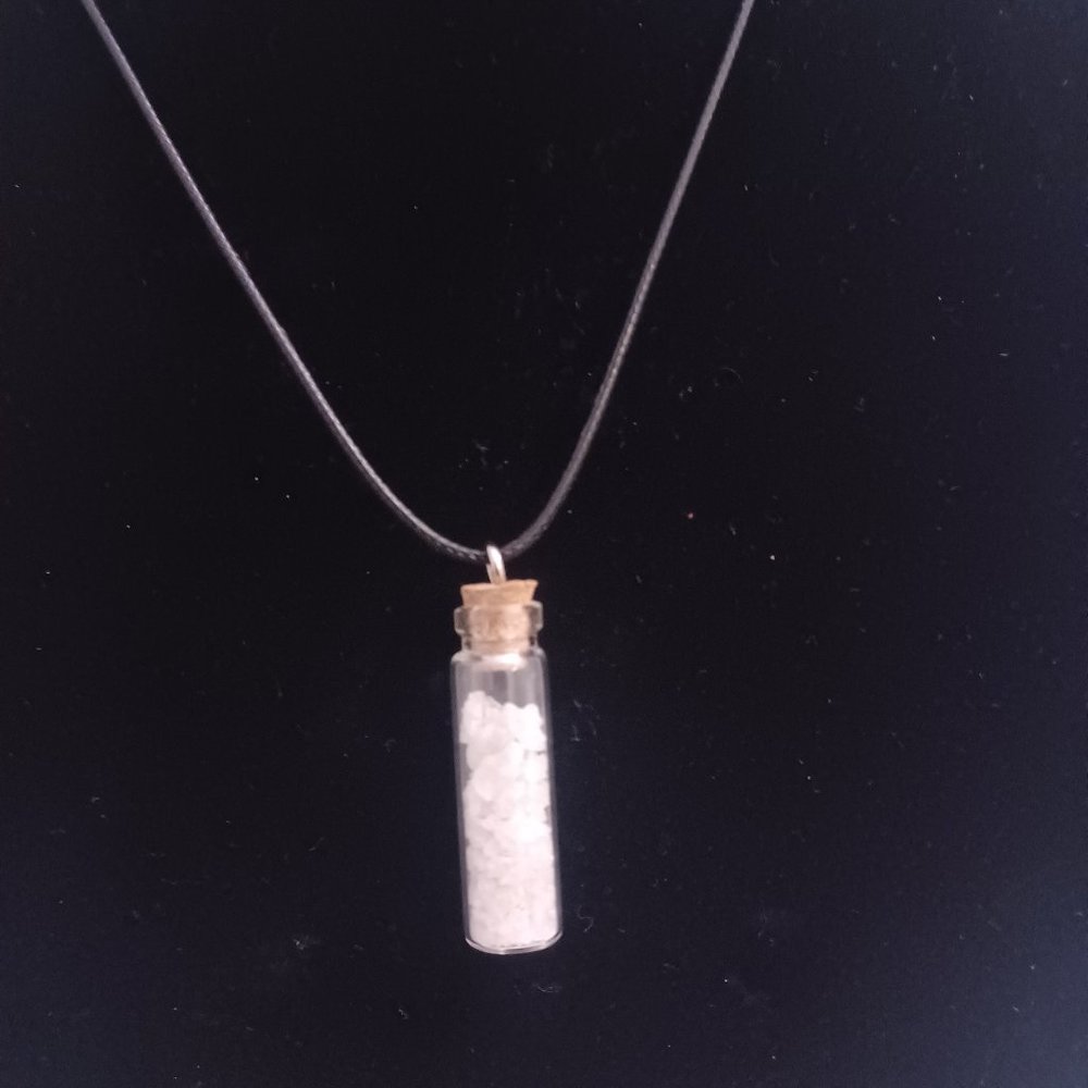Wax necklace with barite filled bottle pendant